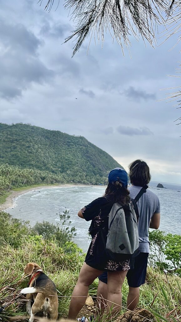 Fiona Quinn and Moe standing on a mountain in Baler